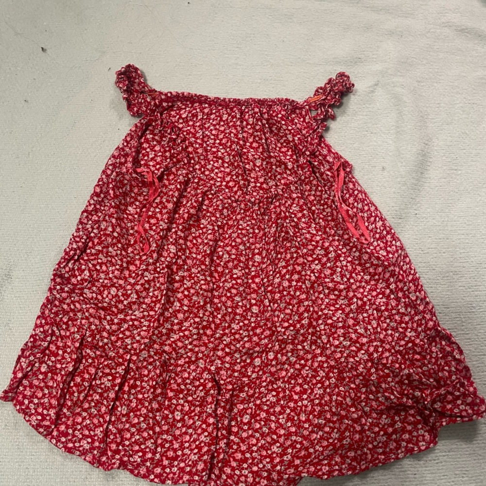 Used red flowy shirt with flowers.
